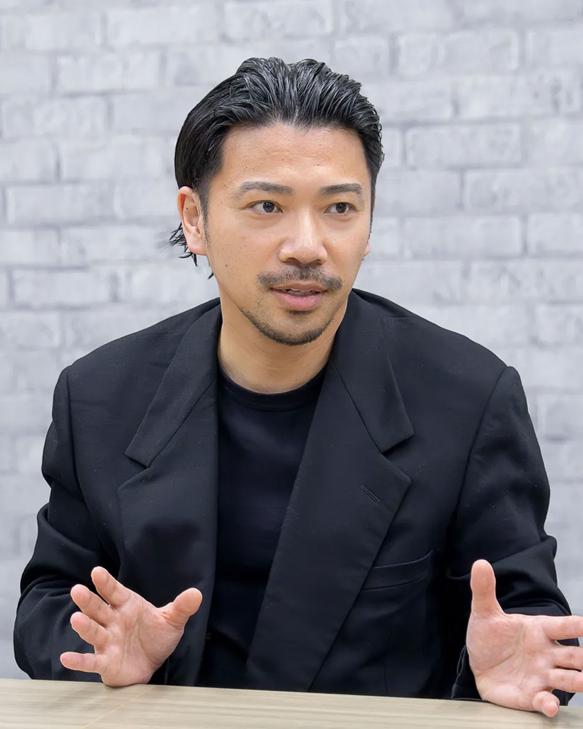 三塚英毅
